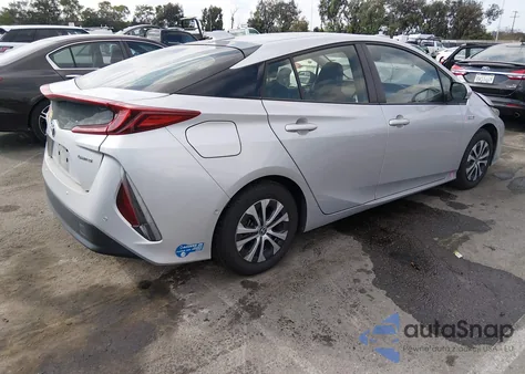 2021 Toyota Prius Prime Limited from USA, damaged, VIN JTDKAMFP1M3183513